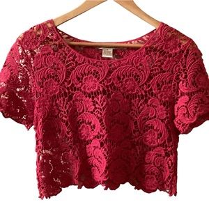 Demanding bright pink crocheted crop top, size small